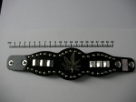 Leather bracelet with metal applique