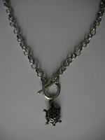Medallion turtle metal