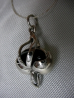 Pendant - an oval transverse leaf