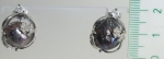 Earrings from big natural black pearls