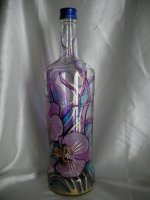 Painted bottle in Decoupage
