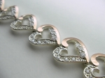 Silver bracelet with gold applique