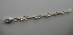 Silver bracelet with gold applique