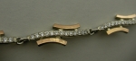 Silver bracelet with gold applique