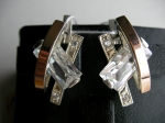 Silver earrings with gold applique