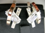 Silver earrings with gold applique