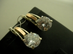 Silver earrings with gold applique