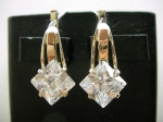Silver earrings with gold applique