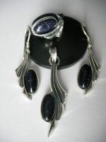 Silver pendant adventurer